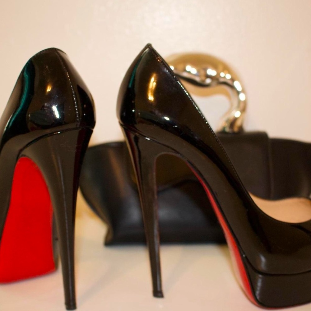 Christian Louboutin peep toe pumps